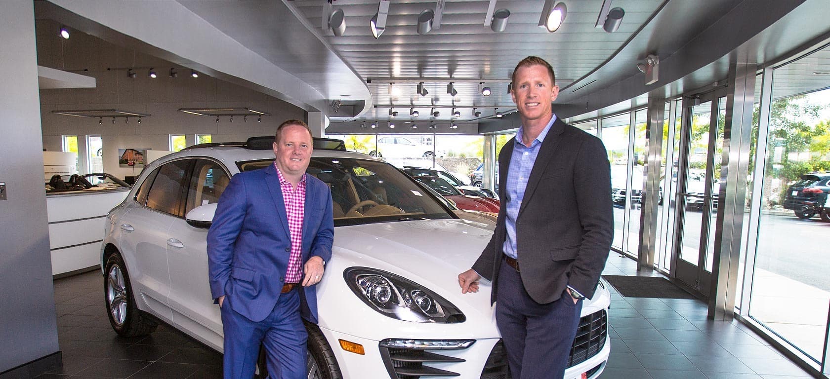 Business professionals at dealership